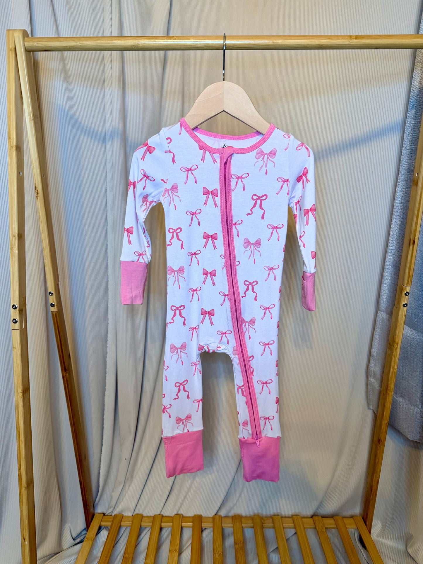 The Bow Onesie